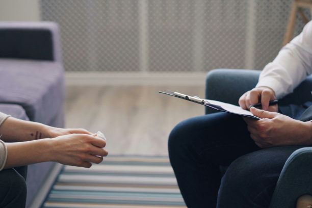 Patient and coach discussing a wellness plan during a coaching session